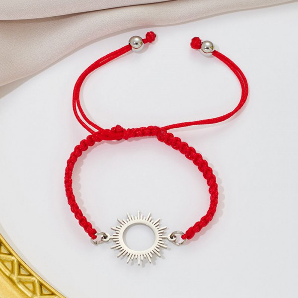 Браслет плетеная нить с серебристым ажурным солнцем CJQ65914