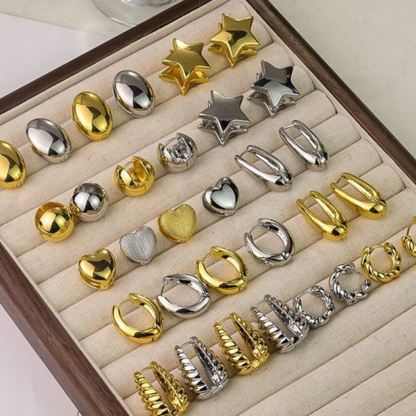 Широкие серьги-кольца с фактурой металла CJH51077