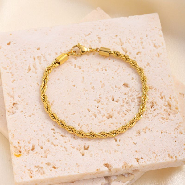 Браслет витой с фактурным плетением в золотистом цвете CJL32428