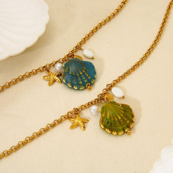 Золотистая цепочка с ракушкой и жемчугом CJP49641