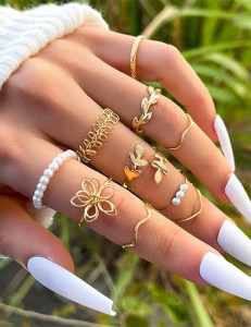 Золотистый сет колец с клевером и жемчужными вставками T68233