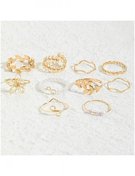 Золотистый сет колец с клевером и жемчужными вставками T68233