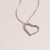 Тонкая цепочка с крупным контурным кулоном-сердцем CJJ24475