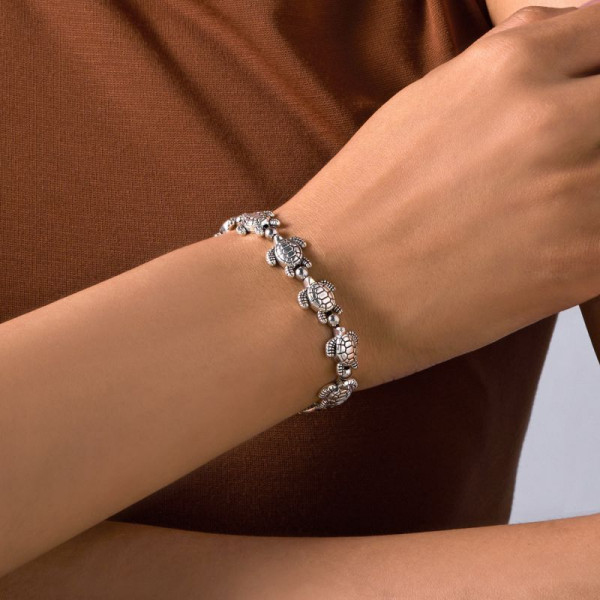 Браслет из синих бусин с ракушкой CJT11315