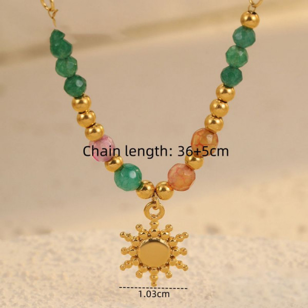 Золотистое колье с солнцем и камнями CJP37333