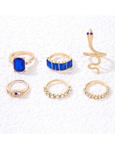 Золотистый сет колец с синими камнями и змеей U73260