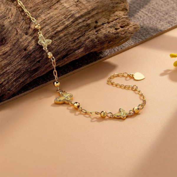 Золотистый браслет с подвесками-бабочками CJL32181