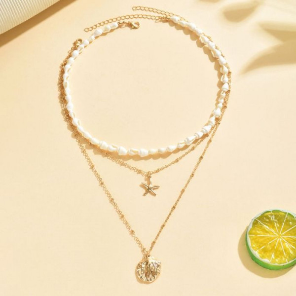 Трехслойное колье с жемчугом, золотыми цепями и ракушкой CJM69587