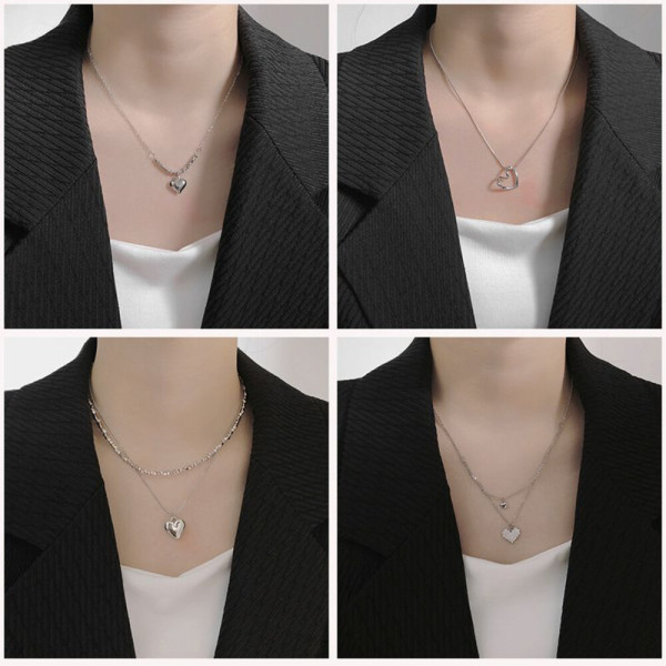 Массивное колье-галстук с черным сердцем и цепями CJH55655