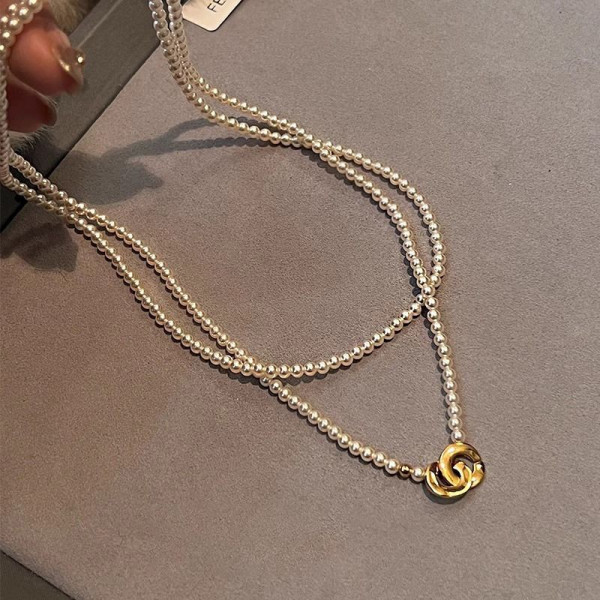 Двойное колье-чокер из мелкого жемчуга с золотистым кольцом CJG36921