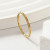 Минималистичное тонкое кольцо из золотистой стали CJD93701