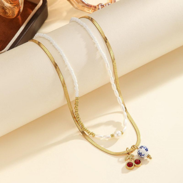 Двухслойное колье из жемчужной нити и цепи с камнями CJP80758