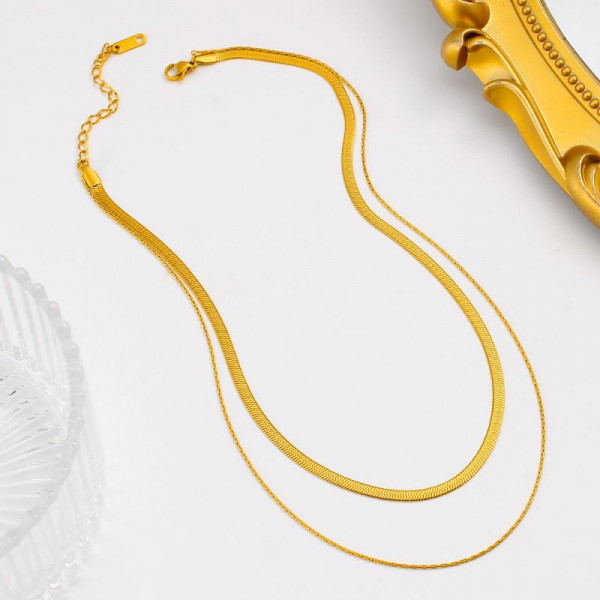 Золотистое двухслойное колье из плоских цепей-лент CJP52796