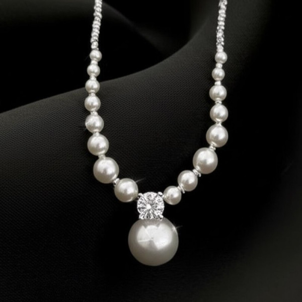 Элегантные жемчужные бусы с нарастающим диаметром 1J11646CJJ