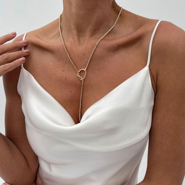 Тонкое серебристое колье-галстук с кольцом и длинной цепью CJL50399