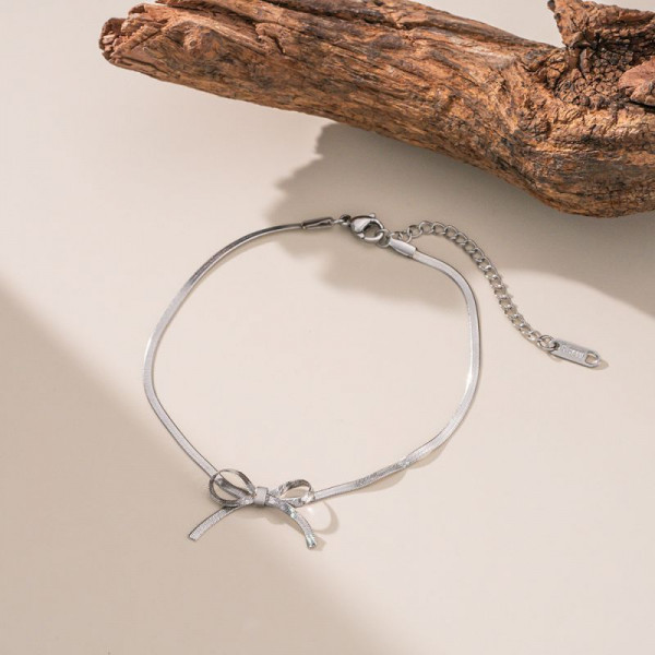 Браслет-цепочка с изящным декоративным бантиком CJP84553