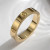 Золотистое стальное кольцо с декором винты J10194CJJ