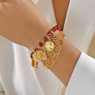 Браслет многорядный из золотистых цепей и бусин CJT15260