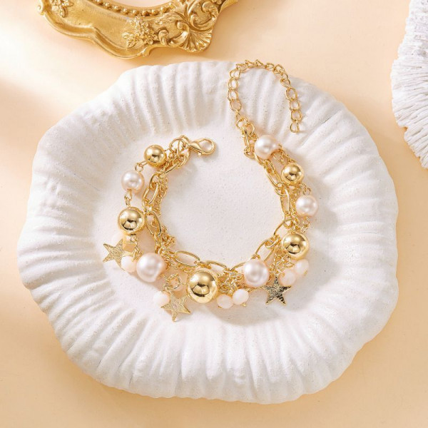 Браслет многорядный из золотистых цепей и бусин CJT15260