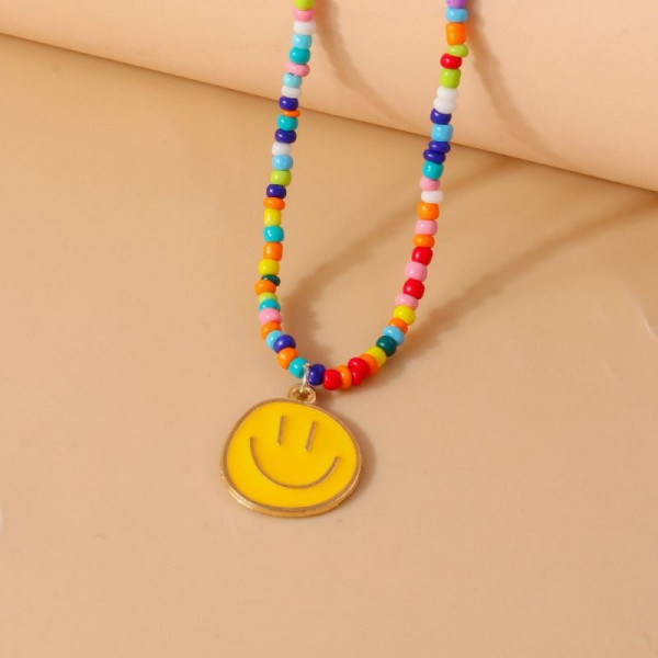 Бусы из фиолетового бисера с подвеской-смайлом CJG44104