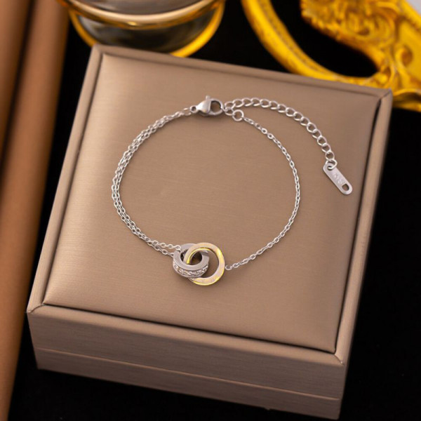 Браслет-нить с переплетенными кольцами CJH32184