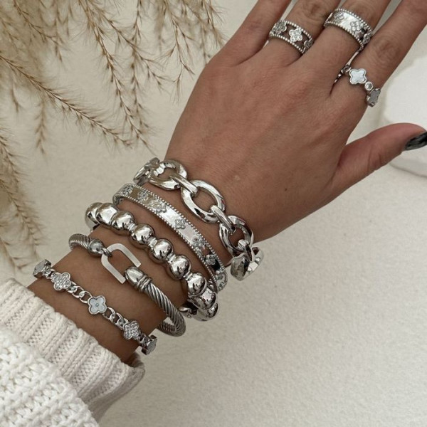 Браслет жесткий золотистый в виде витого жгута CJL16320