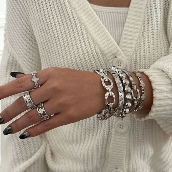 Браслет жесткий золотистый в виде витого жгута CJL16320