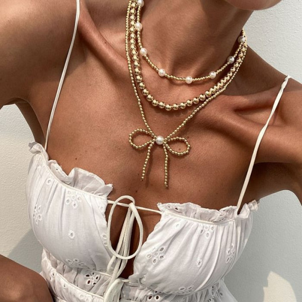 Жемчужное многослойное колье с крупным декоративным бантом CJL23014