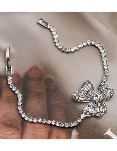 Браслет-дорожка с объемным бантом и кристаллами Z38182