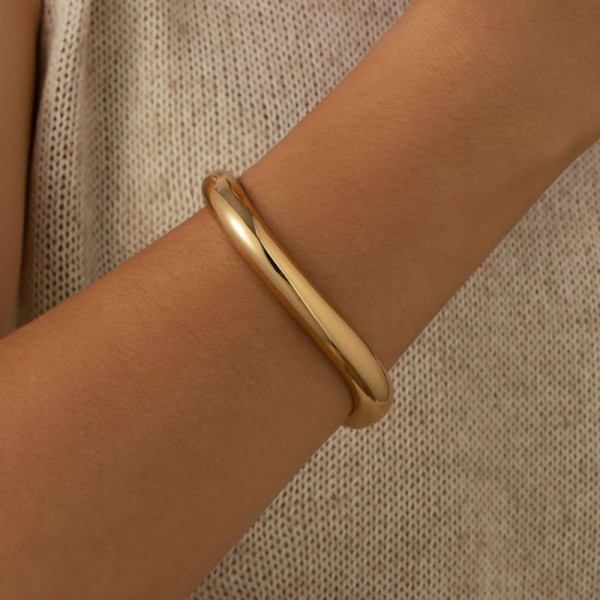 Браслет жесткий трубчатый с золотистым напылением CJG73560