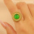 Массивное кольцо с крупным зеленым камнем и орнаментом CJR67893