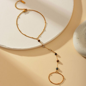 Слейв-браслет гранатовые искры на золотом фоне CJF48517