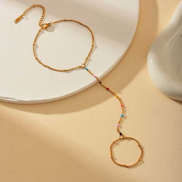 Слейв-браслет гранатовые искры на золотом фоне CJF48517