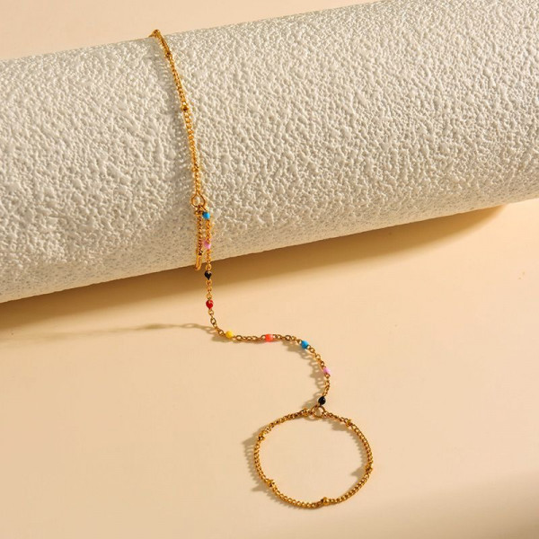 Слейв-браслет гранатовые искры на золотом фоне CJF48517