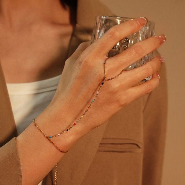 Слейв-браслет гранатовые искры на золотом фоне CJF48517