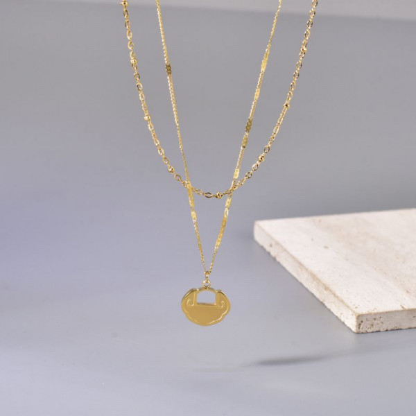 Двойное золотистое колье с круглым медальоном CJL14393