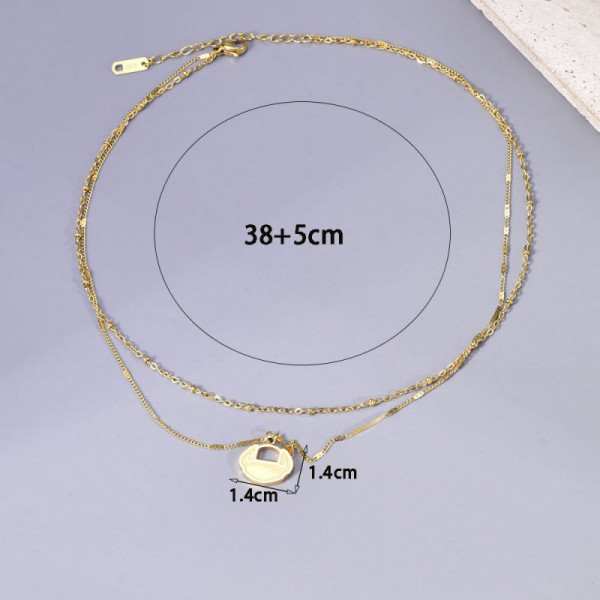 Двойное золотистое колье с круглым медальоном CJL14393