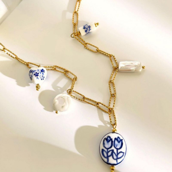 Золотистая цепочка с синими бусинами CJM23586