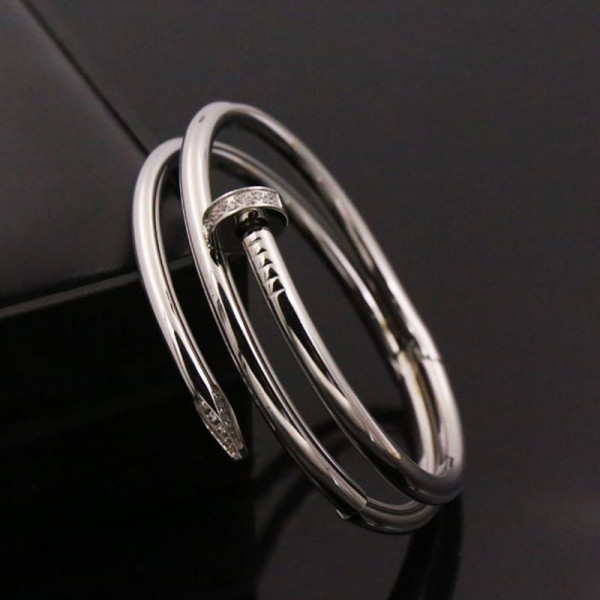 Кольцо в форме изогнутого гвоздя с инкрустацией 1J12062CJJ