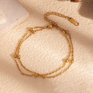 Браслет двухрядный многослойный с декоративными шариками и золотистым напылением CJL30200