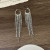 Длинные серьги-каскады из тонких цепей CJP90509