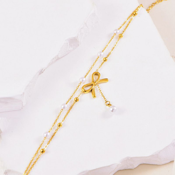 Браслет многослойный с бантом и жемчужными бусинами CJL34039