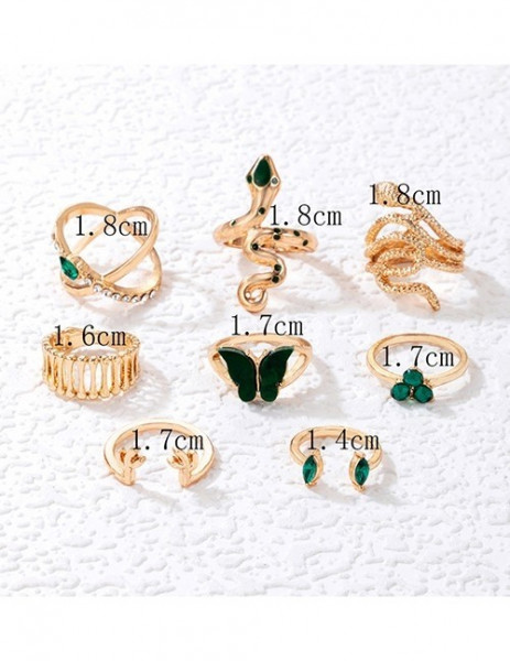 Золотистый сет колец со змеями и зелеными кристаллами U73235