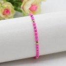 Браслет из яркого бисера с золотистыми вставками N77458