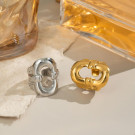 Широкое кольцо с вырезанным геометрическим орнаментом CJN49595