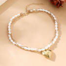 Золотистое жемчужное колье с сердцем CJM16910