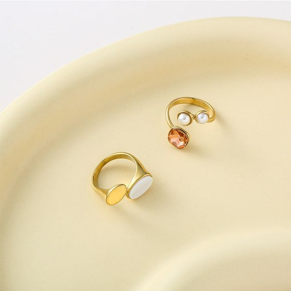 Разомкнутое кольцо с двумя овальными вставками из камня CJL46942