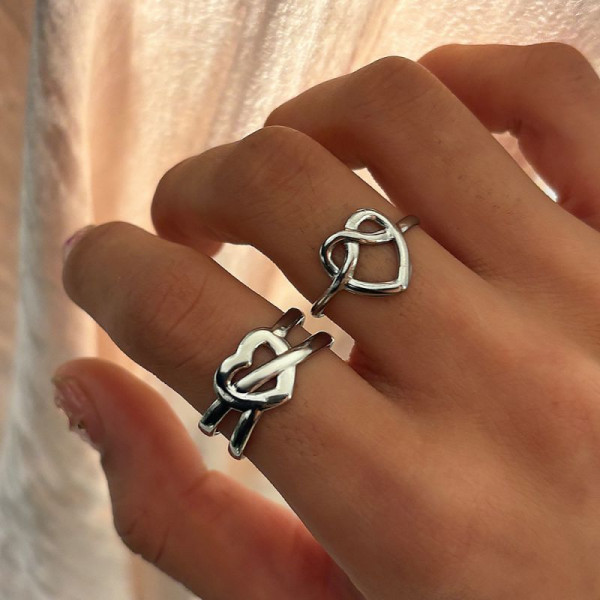 Разомкнутое кольцо из стали в форме сплетенных линий CJL76996