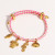 Браслет-нить розовый с фруктовыми подвесками CJR61209