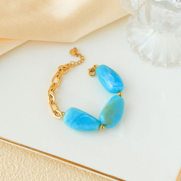 Браслет золотистый с крупными вставками под янтарь CJP93460